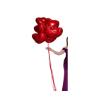 Cluster of red heart-shaped balloons held by a woman in a purple dress