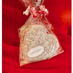 Heart-shaped gift in clear wrap with a "Love Letter" label
