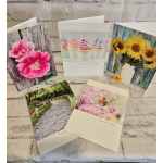 Assorted floral greeting cards with flowers and nature scenes