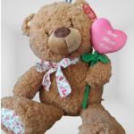 Plush teddy bear holding a pink heart that says Best Mom Ever