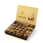 Open box of assorted chocolates in a gift tray