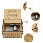 Wooden music box with engraved "Can't Help Falling in Love" text
