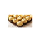 Tray of gold-wrapped chocolates in brown paper cups