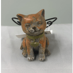 Small cat figurine with wire wings and a collar