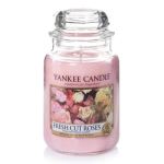 Pink Yankee Candle jar candle labeled Fresh Cut Roses
