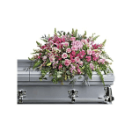 Pink floral spray on a silver casket