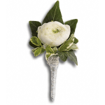 White ranunculus boutonniere with green leaves and a wrapped stem