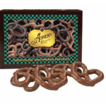 Box of chocolate-covered pretzels with several pretzels in front