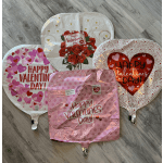 Four Valentine’s Day heart balloons, one with red roses printed on it