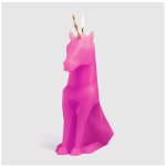 Pink unicorn-shaped candle with a white wick