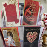 Valentine's Day greeting cards in a clear display rack