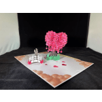 Pop-up card with a pink heart tree and a small bridge scene