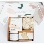 Gift box with body scrub, shower steamers, and soap bars