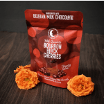 Chocolate candy bag with two orange flowers on a dark surface