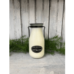Cream candle jar with black handle and label