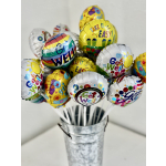 Cluster of get-well balloons in a metal bucket
