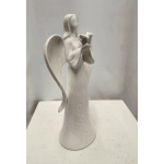 White ceramic angel figurine holding a small bird