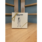 Box of Fine & Raw chocolate tied with a gold ribbon