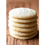 Stack of plain round flatbreads on a wooden surface