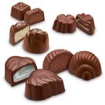 Assorted chocolate truffles with molded tops and cutaway fillings