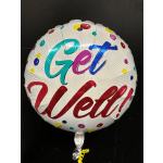 Round foil balloon reading "Get Well" with colorful polka dots