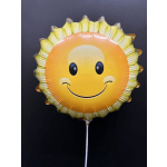 Smiling sun-shaped foil balloon on a stick