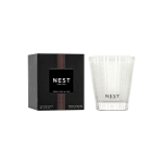 Scented candle in a glass vessel with a black box