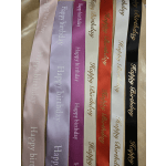 Assorted birthday satin ribbons in pink, purple, red, white, and black