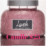 Pink glass candle jar with a silver lid and label