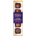 Box of assorted chocolates in purple and gold packaging