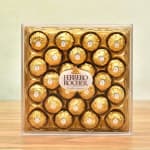 Box of Ferrero Rocher chocolates in gold wrappers