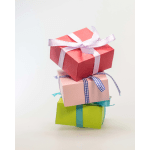 Stack of three wrapped gift boxes with ribbons