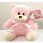 Pink teddy bear with a satin ribbon and gift tag