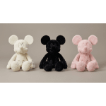 Three plush Mickey Mouse toys in white, black, and pink sit side by side.