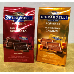 Two Ghirardelli chocolate square bags, one dark chocolate and one caramel milk chocolate