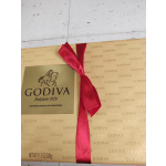 Godiva assorted chocolate gift box with a red ribbon