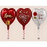 Three heart-shaped foil balloons with love messages and curled ribbons