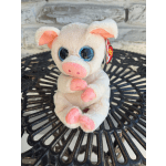Small plush pig with glittery blue eyes and pink accents