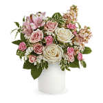 Pink and white roses with alstroemeria in a white vase