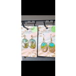 Pair of dangling oval earrings on display cards