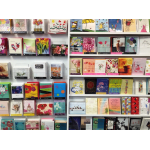 Display shelves of greeting cards with floral and occasion designs