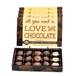 Box of assorted chocolates with a love-themed lid