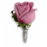 Pink rose boutonniere with silver ribbon wrap and rhinestone accent