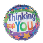 Round foil balloon with colorful stars and the words Thinking of You