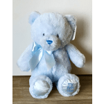 Light blue plush teddy bear with a satin bow and embroidered feet