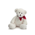 White teddy bear with a red ribbon bow