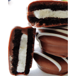 Chocolate-covered sandwich cookies with white filling on a white surface