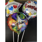 Three colorful congratulatory balloons with star patterns