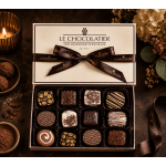 Box of assorted chocolates tied with a brown ribbon