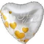 Heart-shaped white balloon with yellow hearts and faint script text